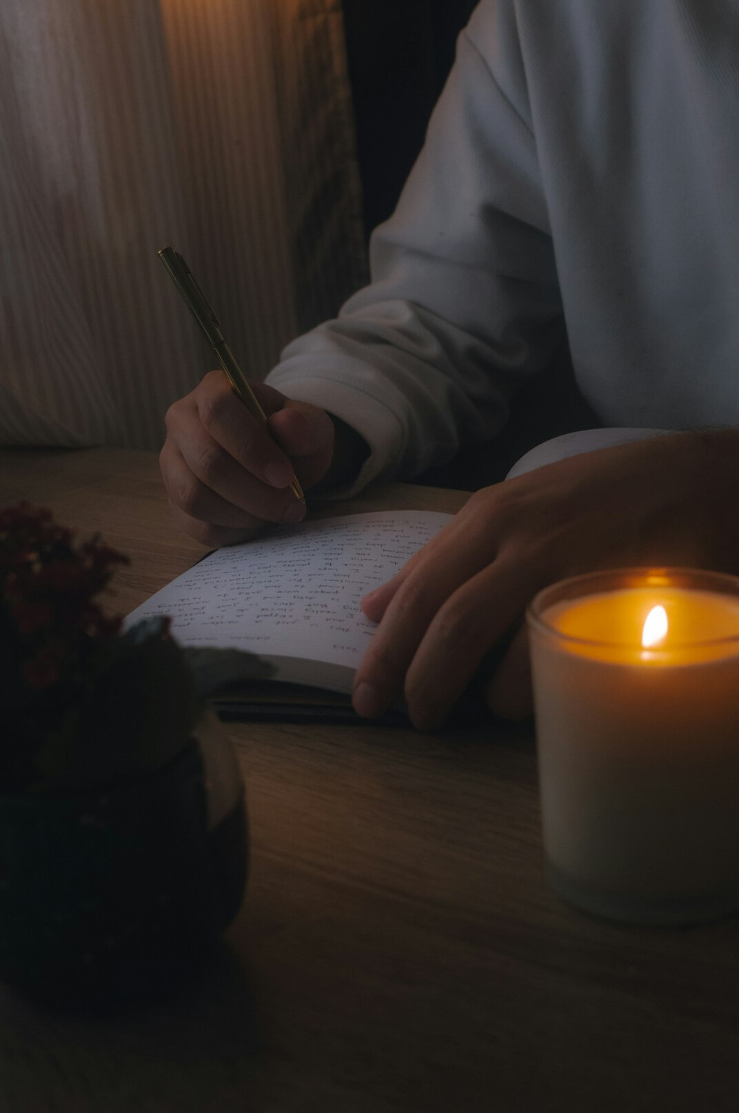 person journaling thoughts