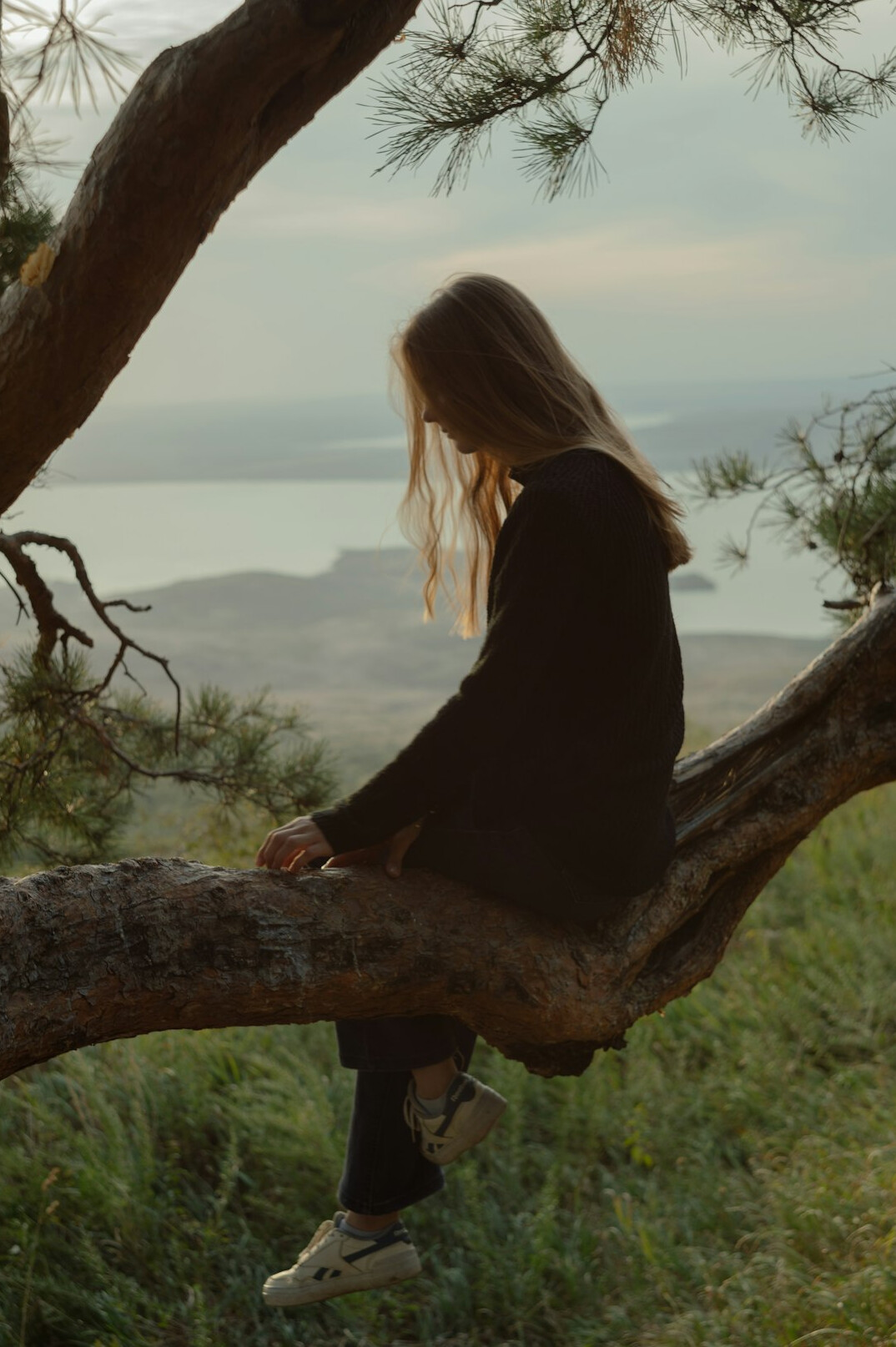 person reflecting outdoors