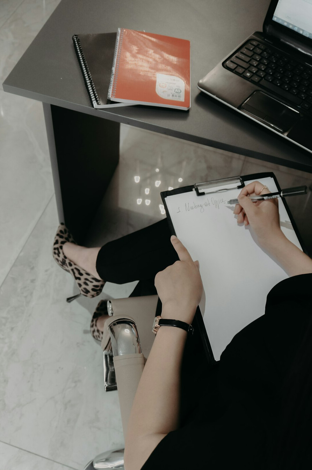 journal writing at desk